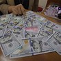 61 Dolar Berapa Rupiah